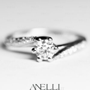 anello-con-diamanti-laterali-0-60-carati-d-vvs1