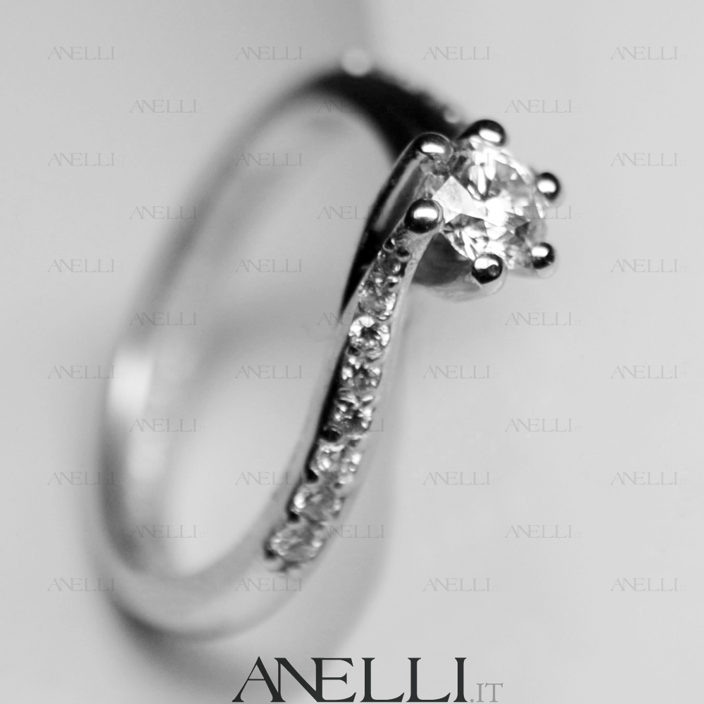 solitario-con-diamanti-laterali-0-60-carati-f-vvs1-6